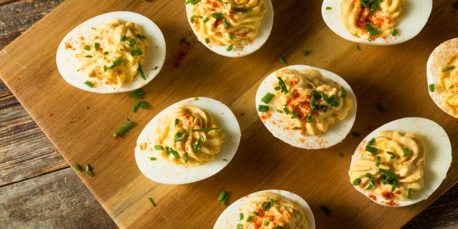 hard-boiled eggs on a cutting board